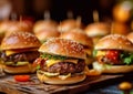 Mini burgers with vegetables,cheese and tomato sauce on wooden table.Macro.AI Generative Royalty Free Stock Photo