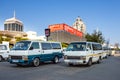 Mini bus taxis in traffic in the city.