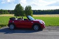 Mini cabrio during summertime parked beside a countryroad Royalty Free Stock Photo