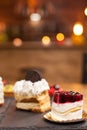 Mini cake with fresh berries and vanilla cream in a coffee shop Royalty Free Stock Photo