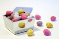 Mini candy chocolate eggs in a polished silver box