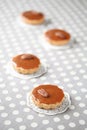 Mini Caramel Pies with Caramel Topping Royalty Free Stock Photo