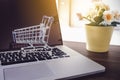 Mini cart on keyboard laptop, Online shopping concept Royalty Free Stock Photo