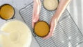 Mini cheesecake recipe. Pouring cheesecake batter into a prepared baking pan, close-up preparation process, view from above