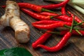 Mini chili peppers with galangal root and leaf of kaffir lime Royalty Free Stock Photo