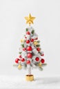 A mini-Christmas tree illustration as a card design for seasonal greetings.