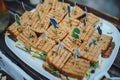 Mini Club Sandwich with chicken beacon ham, Egg Salad Cold Cuts Brioche Sandwiches for Catering, Seminar, Coffee Break, Breakfast Royalty Free Stock Photo
