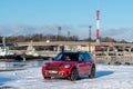 Mini Cooper S Countryman - hybrid car was parked on the side of the port canal on a cold winter day