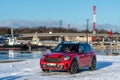 Mini Cooper S Countryman - hybrid car was parked on the side of the port canal on a cold winter day