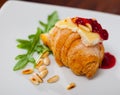 Mini croissant with camembert, jam, pine nuts