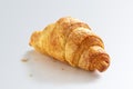 Mini croissant with a Golden crust on a light background