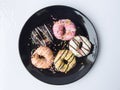 Mini donuts with colorful sugar topping Royalty Free Stock Photo