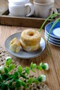 Mini donuts sugar on wooden table on styling Royalty Free Stock Photo