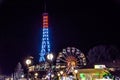 Mini Eiffel Tower and Ferris Wheel on promenade of resort Royalty Free Stock Photo