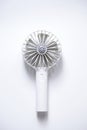 Mini electric fan with handle  on white background Royalty Free Stock Photo