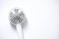 Mini electric fan with handle  on white background Royalty Free Stock Photo