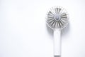 Mini electric fan with handle isolated on white background Royalty Free Stock Photo