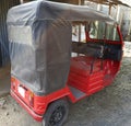Mini Electric Rickshaw image, Red Rickshaw image, Background, Selective Focus,Rickshaw image ,Burdwan ,India- November 15, 2020: