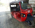 Mini Electric Rickshaw image, Red Rickshaw image, Background, SelectiveFocus, November 13, 2020 in Burdwan,India