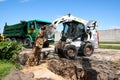 Mini excavator at construction site Royalty Free Stock Photo