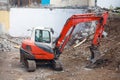 Mini excavator on a construction site