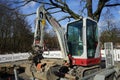 Mini excavator TAKEUCHI TB 216 at the construction site. Berlin, Germany Royalty Free Stock Photo