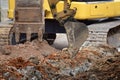 Mini excavator working in construction site Royalty Free Stock Photo