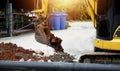 mini excavator is working on a construction site Royalty Free Stock Photo