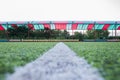 Mini Football Goal On An Artificial Grass . Inside of indoor football field . soccer field center and ball top view background Royalty Free Stock Photo