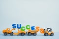 Mini forklift bulldozer truck and road roller machine with text Royalty Free Stock Photo