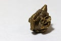 Mini Ganesha made from brass on white background, the son of Uma Devi god in Hinduism and Brahmanism. Royalty Free Stock Photo