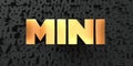 Mini - Gold text on black background - 3D rendered royalty free stock picture