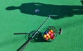 Mini golf putt putt clubs colorful balls shadow Royalty Free Stock Photo