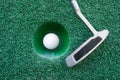 Mini golf scene with ball and club Royalty Free Stock Photo