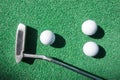 Mini golf scene with ball and club Royalty Free Stock Photo