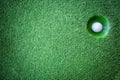 Mini golf scene with ball and hole Royalty Free Stock Photo