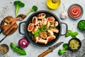 Mini grilled sausages on a frying pan. Barbecue. Meat menu. Royalty Free Stock Photo