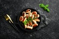 Mini grilled sausages on a frying pan. Barbecue. Meat menu. Royalty Free Stock Photo