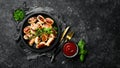 Mini grilled sausages on a frying pan. Barbecue. Meat menu. Royalty Free Stock Photo