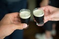 Mini guiness beer cheers Royalty Free Stock Photo