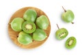 mini kiwi baby fruit or actinidia arguta in wooden bowl isolated on white background with full depth of field. Top view Royalty Free Stock Photo