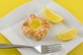 Mini lemon danish pastry with lemon wedges
