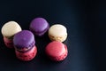 mini macaron different colour in a dark background Royalty Free Stock Photo