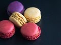 mini macaron different colour in a dark background Royalty Free Stock Photo