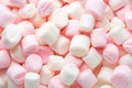 Mini marshmallows of white and light pink colors. Selective Focus. Top view