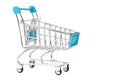 Mini metal market trolley on a white background