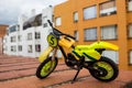 Mini Motocross Motorcycle Toy with Building background