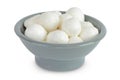 Mini mozzarella balls in a grey ceramic bowl isolated on white background with full depth of field. Royalty Free Stock Photo