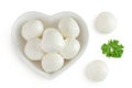 Mini mozzarella balls with parsley in a ceramic bowl isolated on white background. Top view. Flat lay. Royalty Free Stock Photo