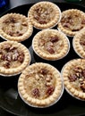 Mini Pecan Butter Tart on Black Tray Royalty Free Stock Photo